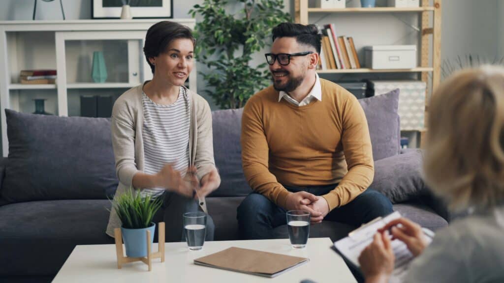 A foster mom and dad receive one-on-one help from their Personal Support Agent with Every Child Compass.