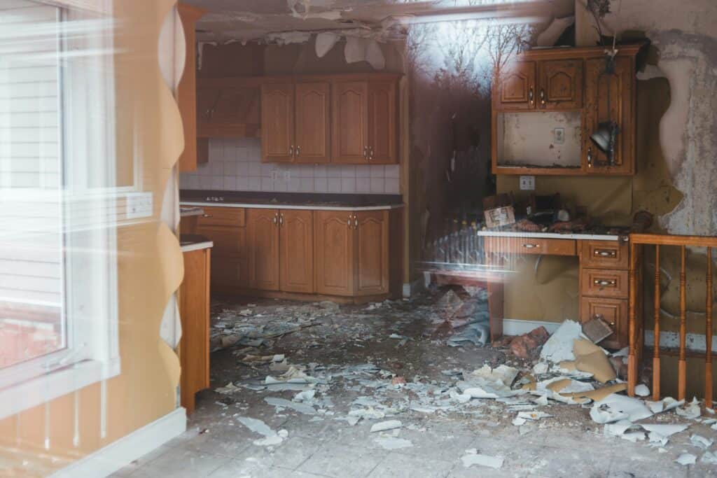 Costly home repairs, like this kitchen with a damaged ceiling, are some of the most common barriers to family reunification in foster care.